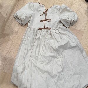 Elegant Cream Maxi Dress with Brown Accents